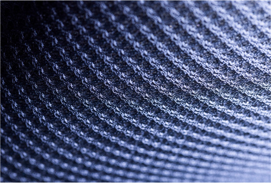 A close-up photo of a blue piece of fabric.